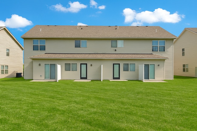 Building Photo - Eagle Creek Townhomes - Enjoy $50 off your monthly rent when you sign a 15-month lease.