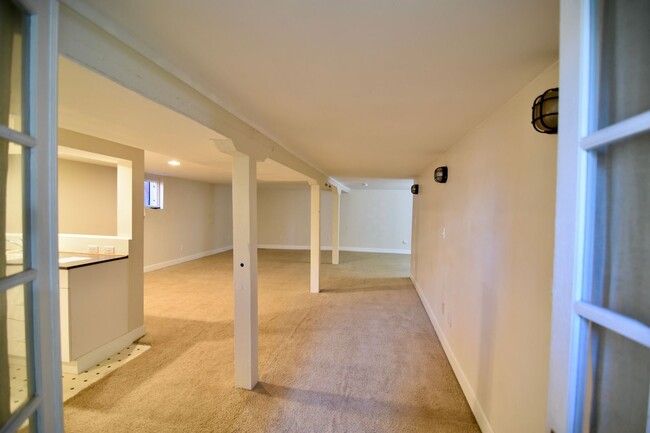 Building Photo - Large studio! Laundry room on site! Coming...