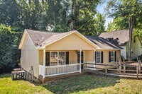 Building Photo - SW Updated Home - Wood Laminate Flooring, Front Porch & Deck!