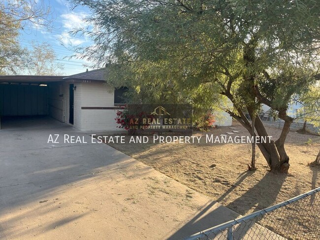 Building Photo - 3841 N 63rd Dr