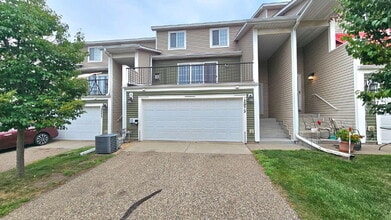 Building Photo - Charming 2-Bed Townhouse Retreat on Harriet Ave  available now.