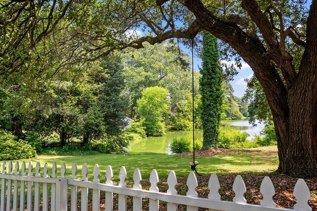 Building Photo - Beautiful brick home on a 1-acre lakefront...