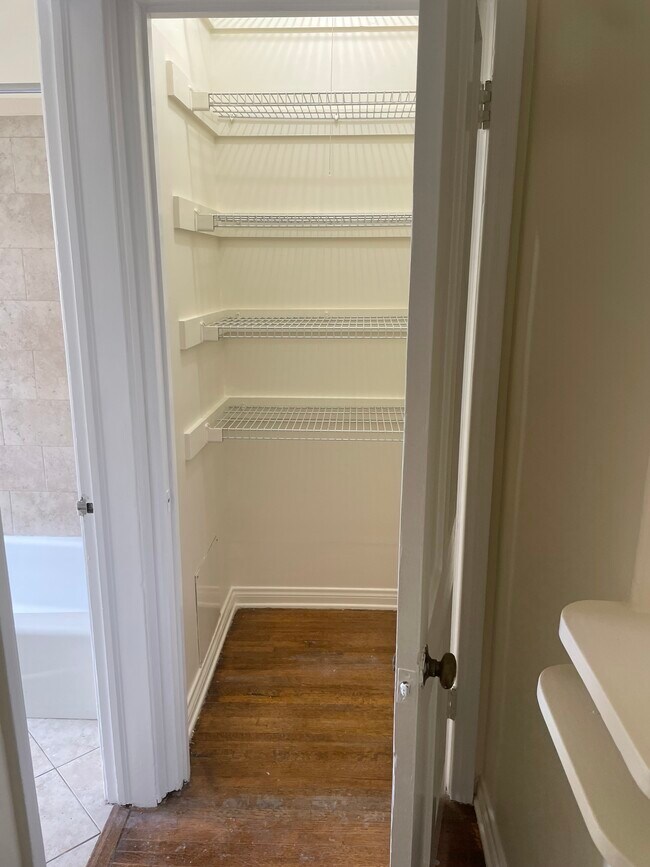 hall closet - 5906 San Vicente Blvd