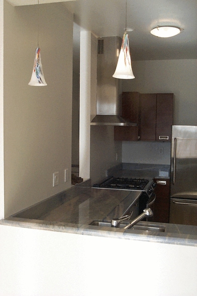 Kitchen has modern appliances - 12A Reno Pl