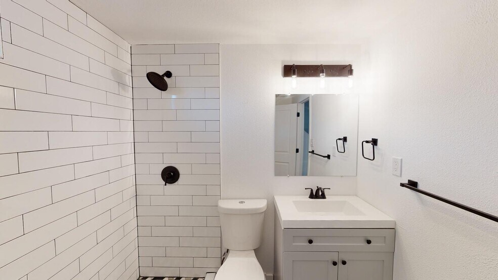 Building Photo - Classic brick Montclair home with covered ...