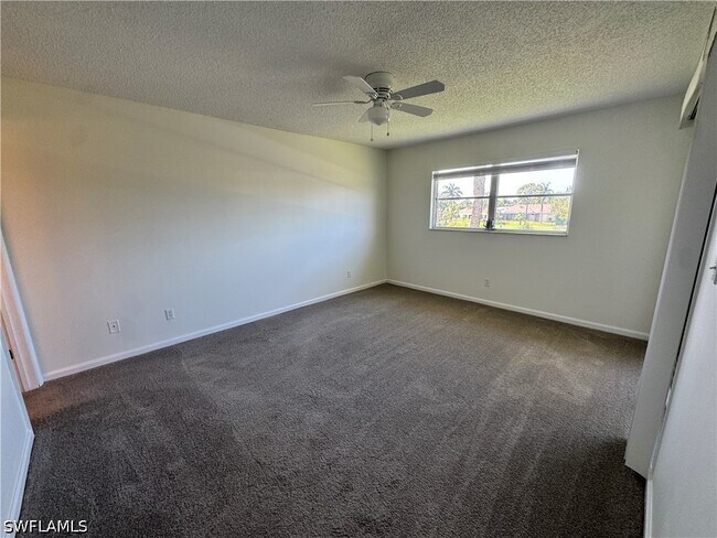 Building Photo - 12250 Tamiami Trl E