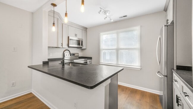 Building Photo - UPDATED 2BR/2.5 BA Condo with Garage in th...