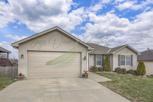 Building Photo - STUNNING GRAIN VALLEY HOME!!!