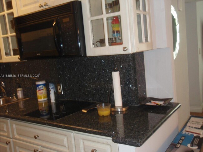 Building Photo - 6969 Collins Ave