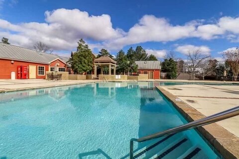 swimming pool with lounge chairs - 2100 Old Taylor Rd