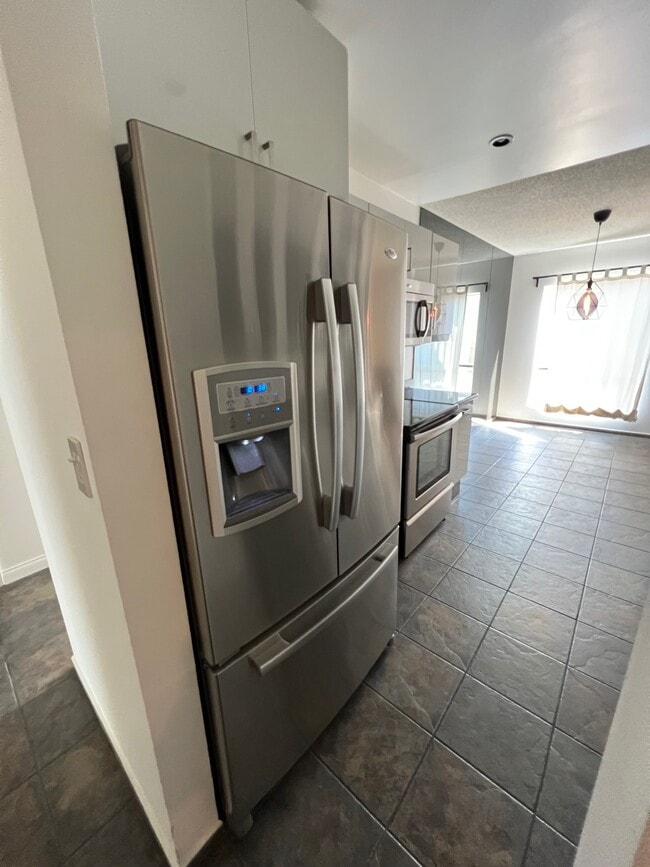 Kitchen to Dining - 7300 Franklin Ave