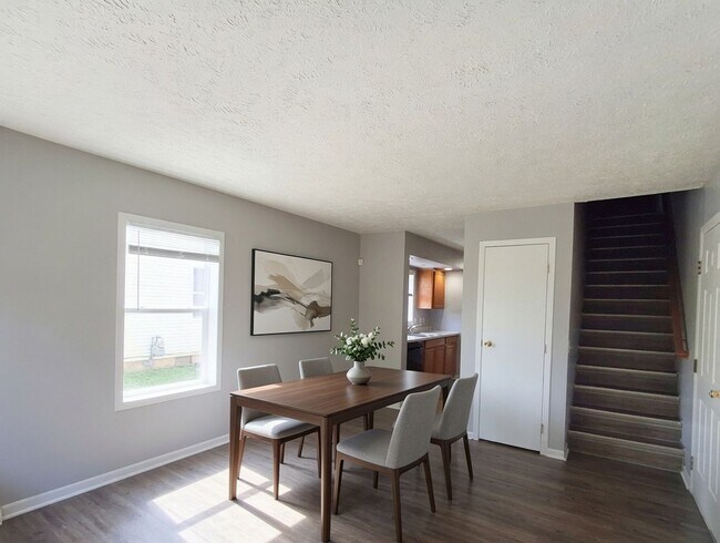Building Photo - 4 Bed / 2 Full Bath House on a Quiet Dead-End Street — Attached Garage, Central A/C, W/D Hookups ...