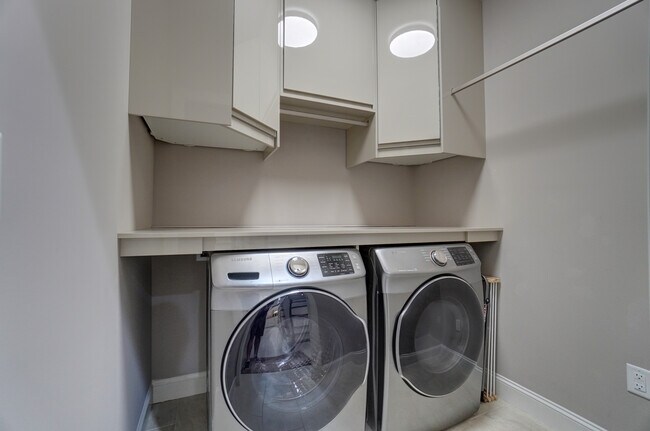 Laundry area with folding table - 2335 Sylvia Court