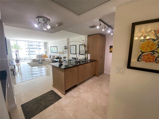 Building Photo - 10275 Collins Ave