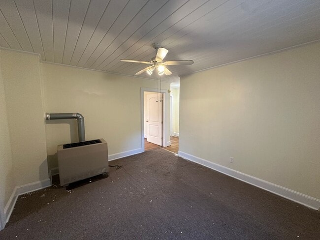 Building Photo - Your Slice of Serenity : Country Charm Awa...