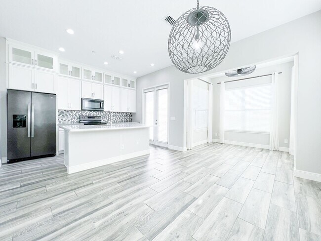Building Photo - Luxury 4-Bedroom Townhome in Laureate Park – Now Available!