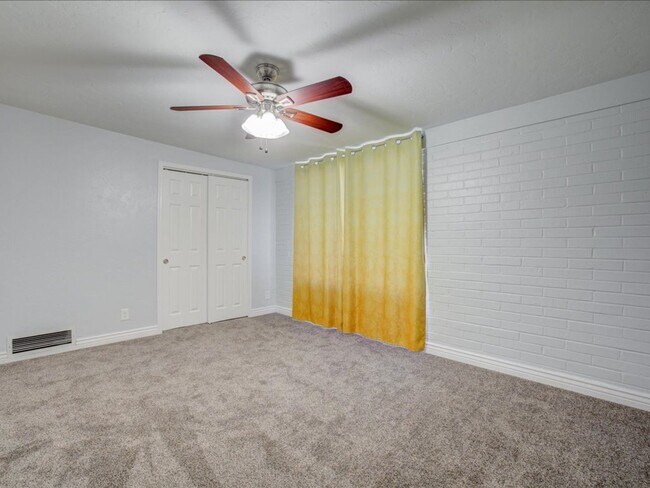 Building Photo - Spacious 4-Bedroom, 2-Bath Home with Extended Driveway & Large Backyard