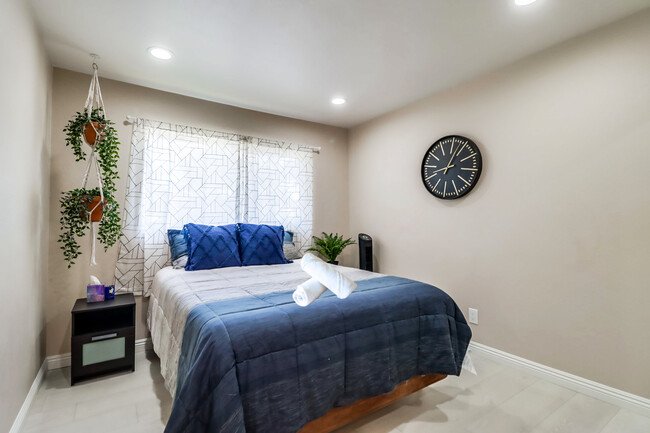 Wake up to a bright & refreshing morning on your comfy queen bed in Bedroom 3 - 524 Telegraph Canyon Rd