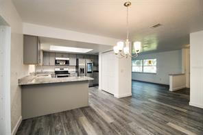 Building Photo - Recently updated, custom 3/2/2 on fenced c...