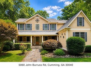 Building Photo - Three Levels. Two Kitchens. Seven Bedrooms. Endless Possibilities.