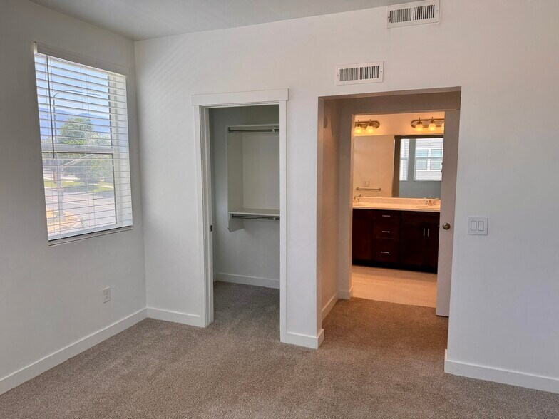 Primary Closet / Bathroom - 8395 S Iris Lumi Ln