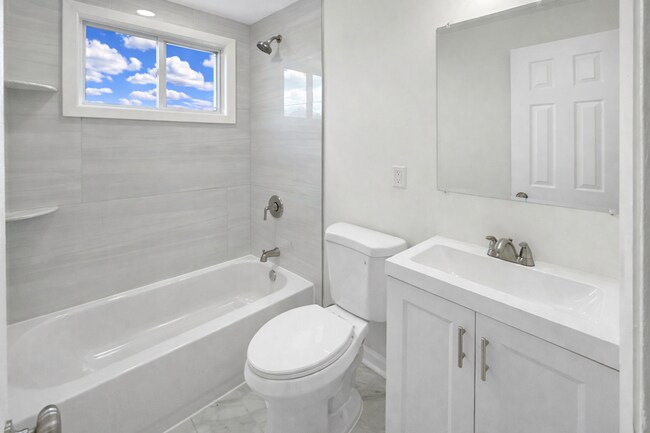 Building Photo - Spacious 3BR Home with Finished Basement & Flex Space