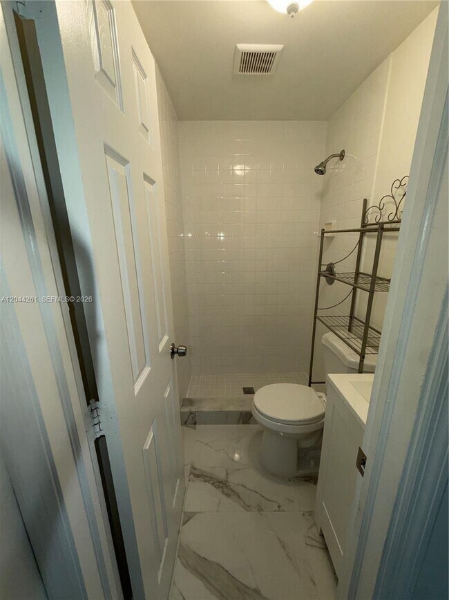 Building Photo - 6497 W 8th Ln