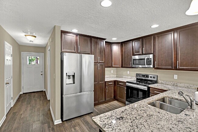 Building Photo - Like new 4 bedroom 2 bath home for rent.
