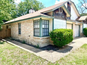 Building Photo - MUST SEE! Spacious Duplex With Garage & Google Fiber Access!