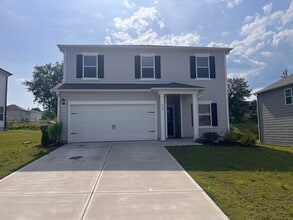 Building Photo - Graham Rental with Open Layout, Den, and 2...