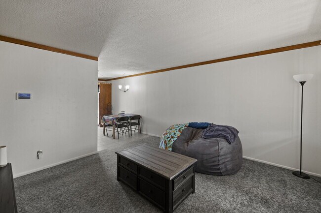 Building Photo - Updated 2 Bed + Bonus Workshop | Huge Backyard | Two Storage Sheds | Carport | Pet Friendly