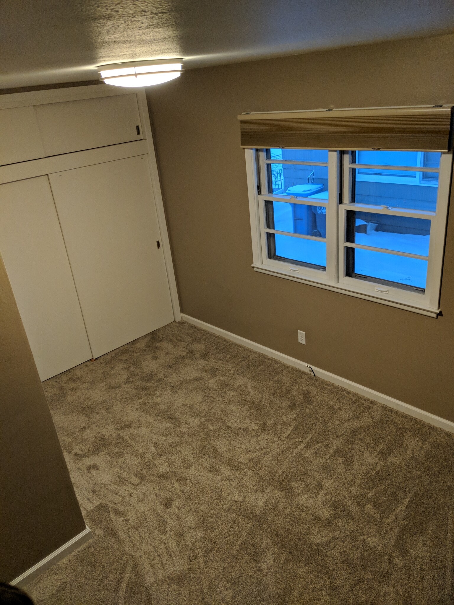 Bedroom One Large closets and new carpet - 705 E. 19th Street
