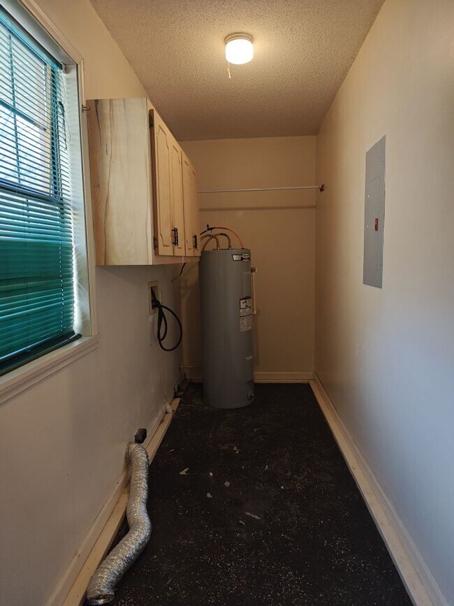 Building Photo - Elegant & Spacious 3-Bedroom Brick Home with Private Garage