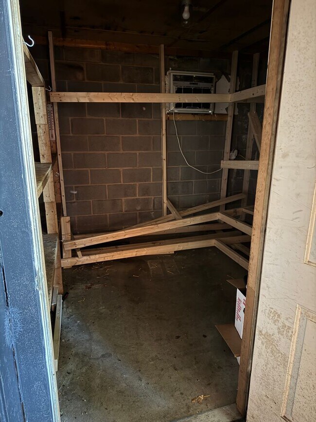 Building Photo - Prime Commercial Space for Rent in Downtown Granite Quarry - 1,323 Sq Ft with Bay Doors