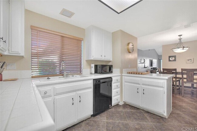 Large bar with area for bar stools - 1073 S Romney Dr