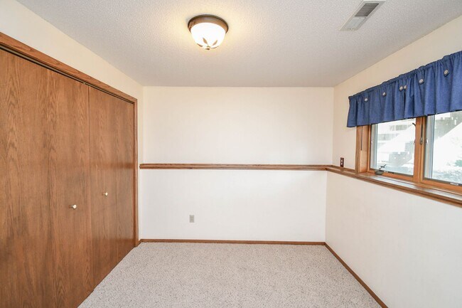 Building Photo - Spacious 4-Bedroom Acreage with Stunning Views Near Hartford — 1.5 Acres of Country Living!
