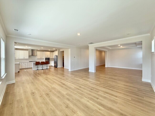 Building Photo - Luxurious 5BD, 4.5BA Holly Springs Home in an HOA Community with Resort-Style Amenities near Down...