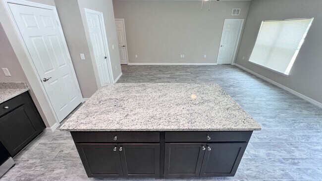 Building Photo - Spacious 3-Bedroom Home with Garage & Pati...