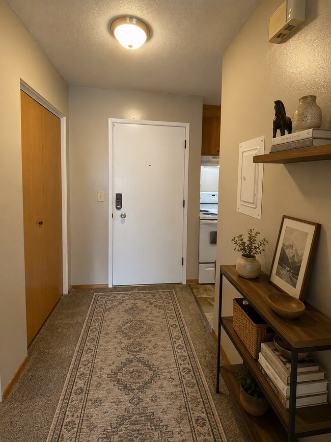 Building Photo - Keyless Entry • On-Site Laundry • Free WiFi