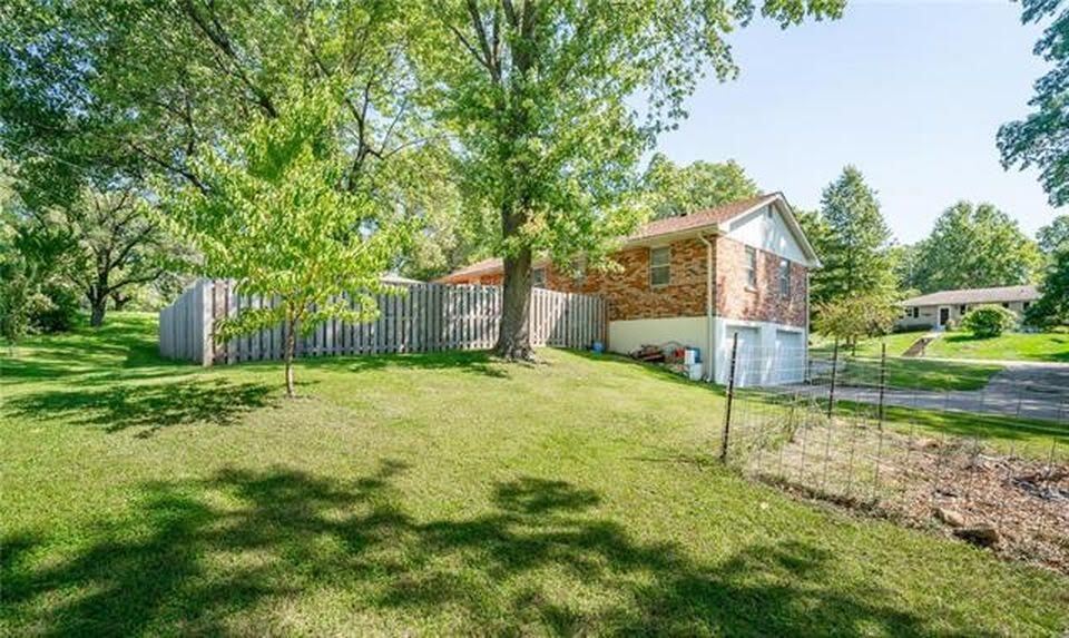 The large yard outside of privacy fence area. Garden bed - 7416 N. Central St.