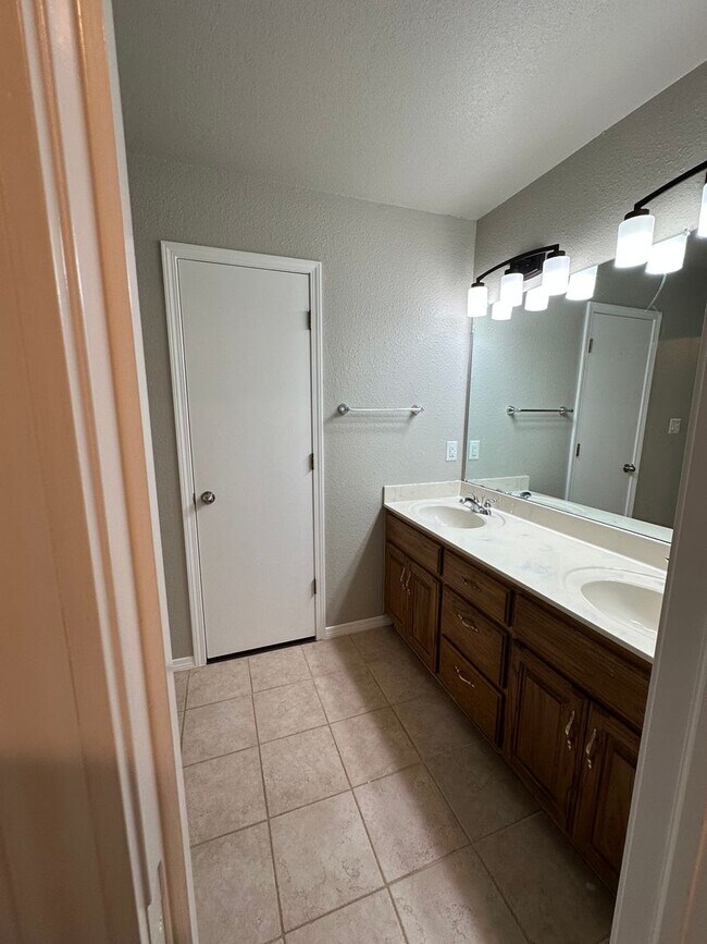 Building Photo - Clean, updated home on a corner lot with privacy fence and storage shed.