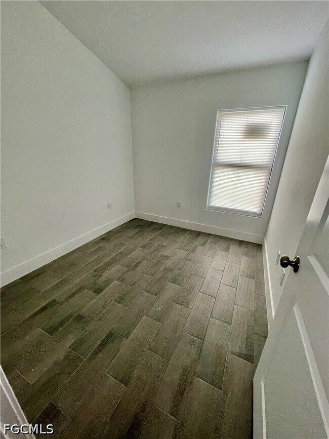 Building Photo - 1113-1115-1115 W 12th St