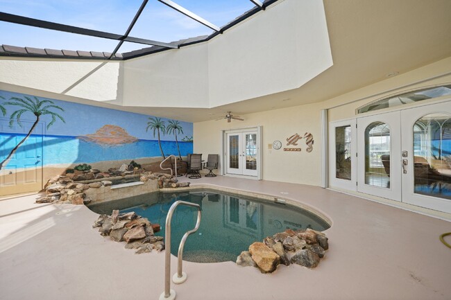 Building Photo - "Waterfront home with Courtyard Pool"