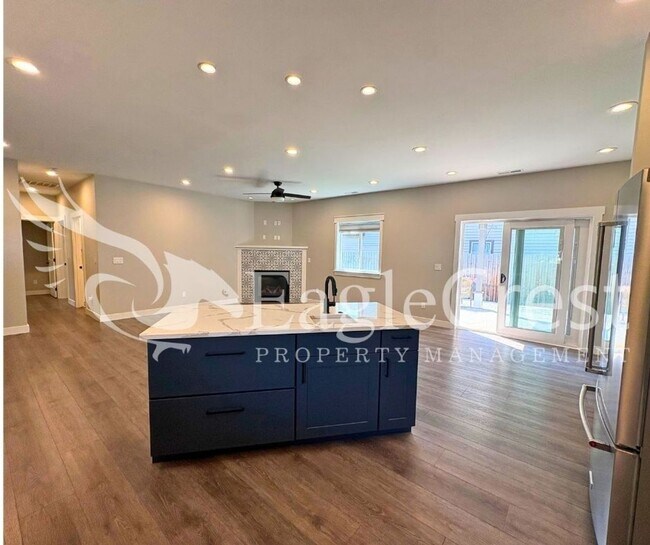 Building Photo - Contemporary Home With A Covered Patio & Quartz Countertops