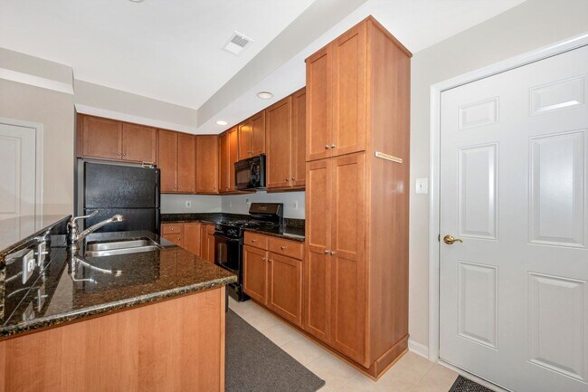 Building Photo - Desirable Two Level Condo For Lease - Not Pet Friendly