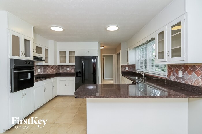 Building Photo - 3975 Sandy Plains Rd