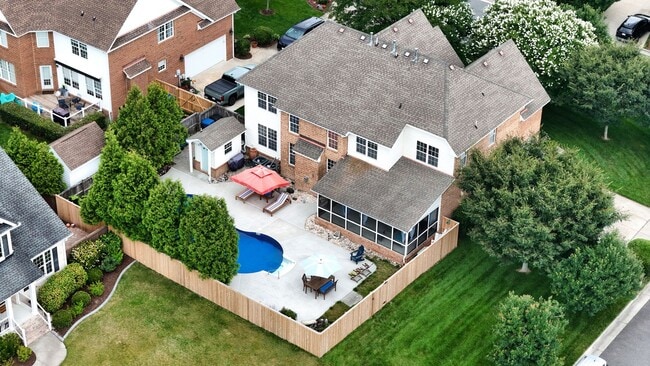 Building Photo - Beautiful brick home with a saltwater pool
