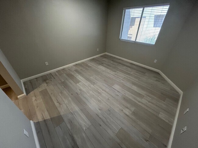 Building Photo - INVITING 2 BEDROOM TOP FLOOR CONDO IN A CE...