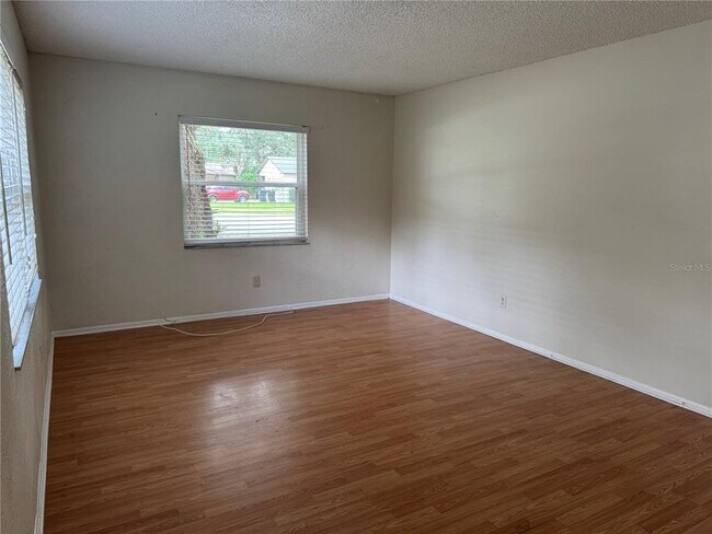 Building Photo - 4010 Woodsong Dr