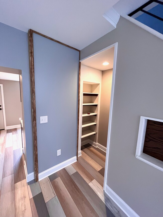 Shelving by basement stairs - 3053 Tulip St